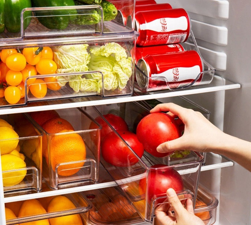 Storage bins organising shelves inside a fridge