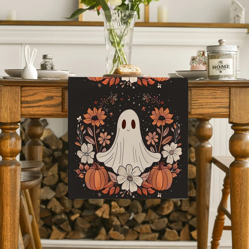 Halloween table runner draped over a table edge