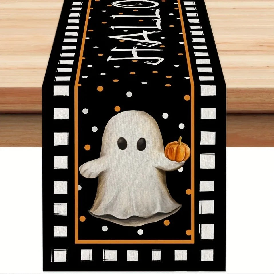 Ghost with pumpkin runner on a table