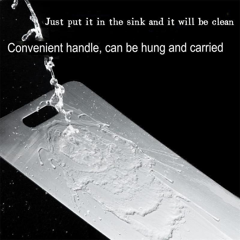 Water running off the steel board, with its hanging handle